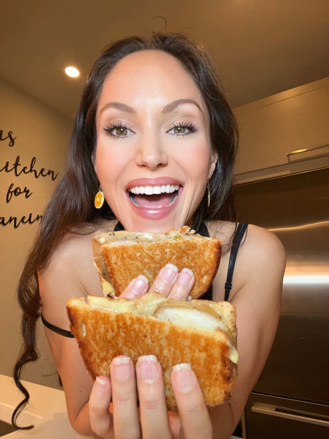 Cheryl Martinez presenting the vegan grilled cheese and pear sandwich featured in her Silver Hills Bakery collaboration